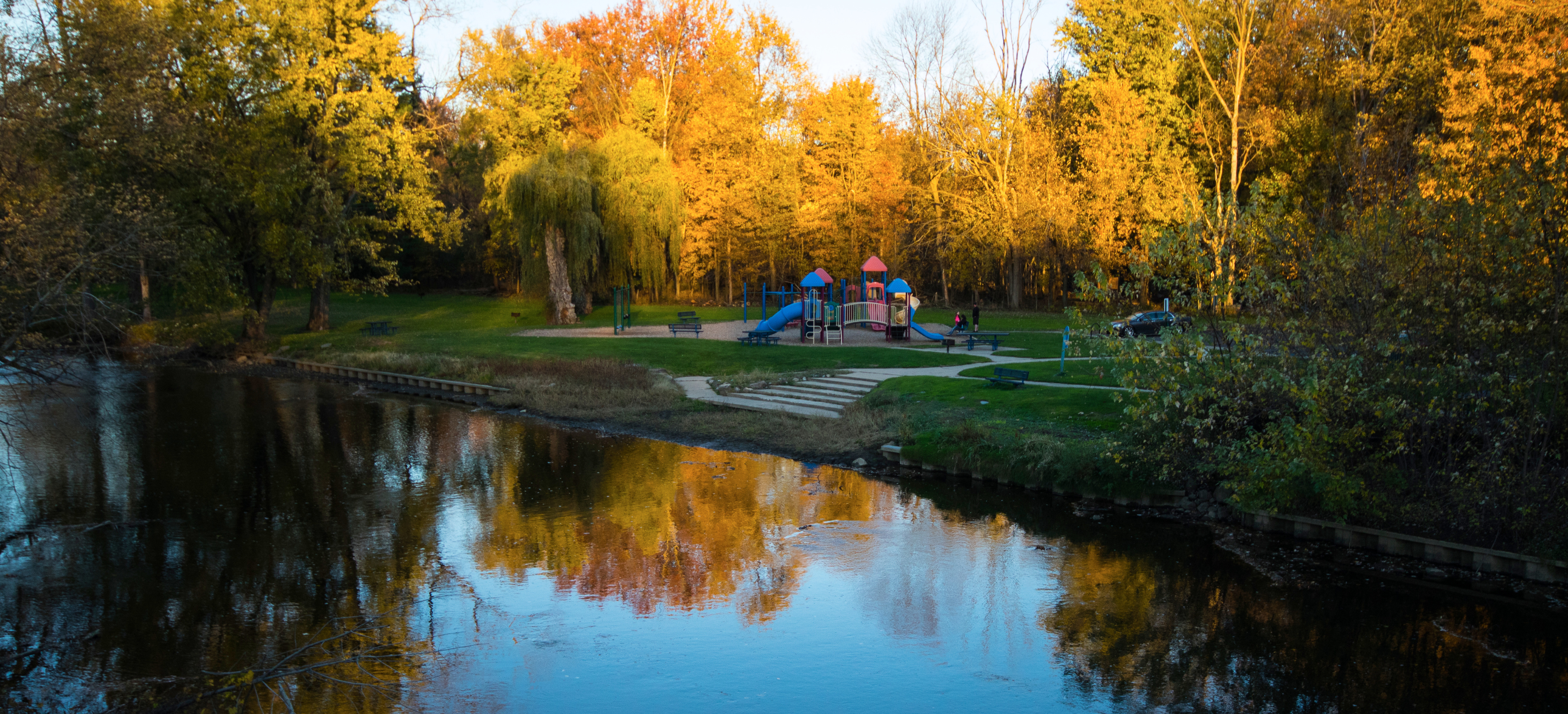 River with playground in background