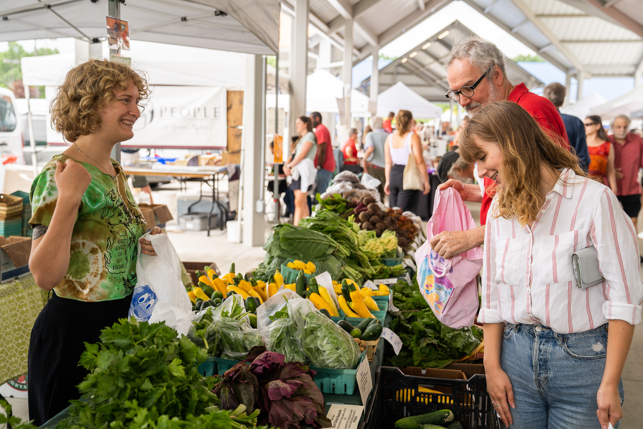 Two shoppers at the Meridian Township Farmers' Market