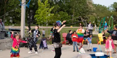 Attendees of the Meridian Pride event playing with bubbles